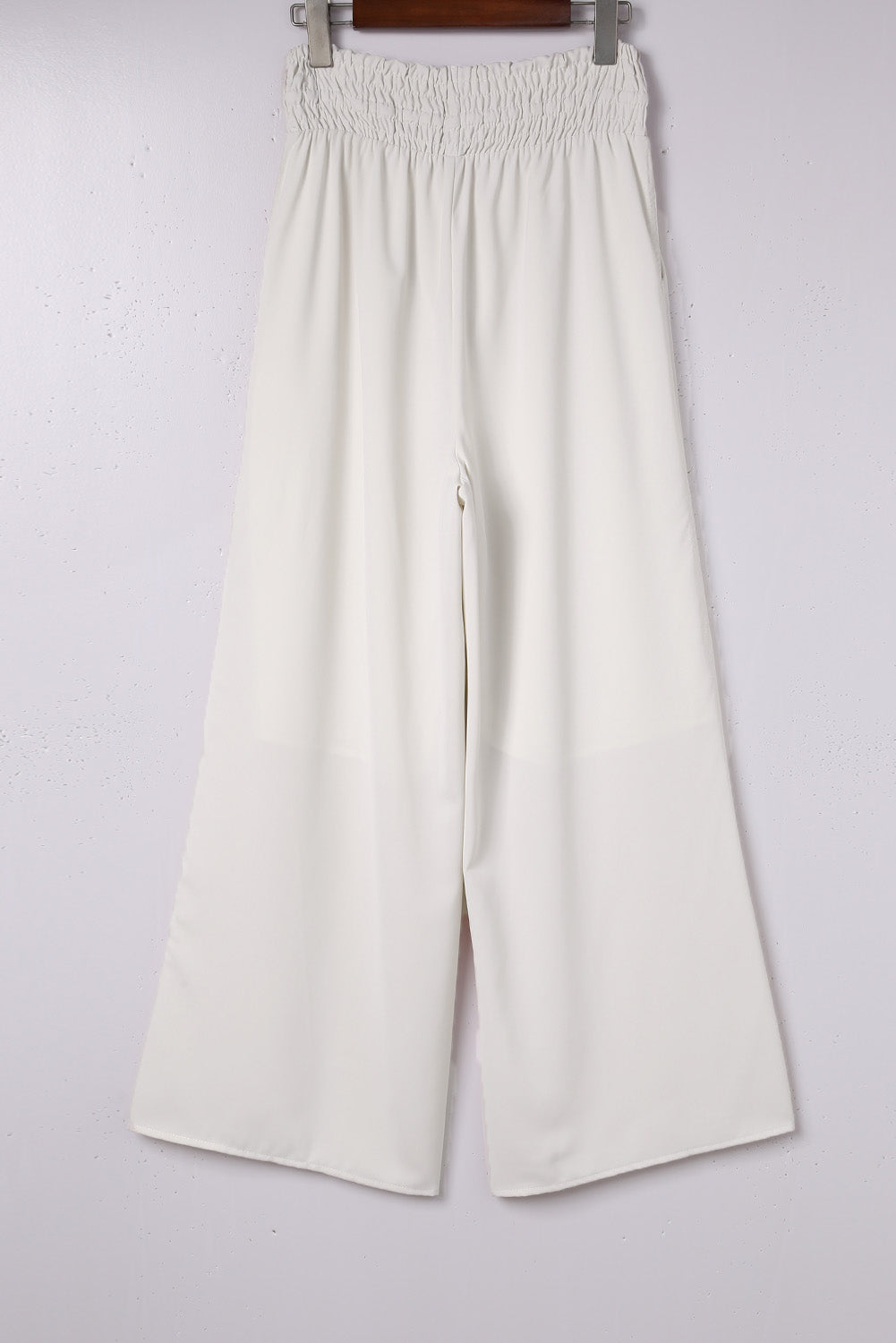 Pantalon large smocké beige taille haute 