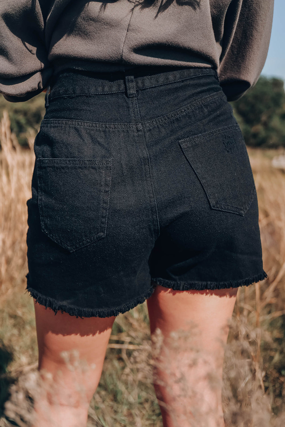 Short en denim déchiré asymétrique noir 