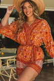 Barboteuse portefeuille florale style Boho orange, col en V, taille nouée 