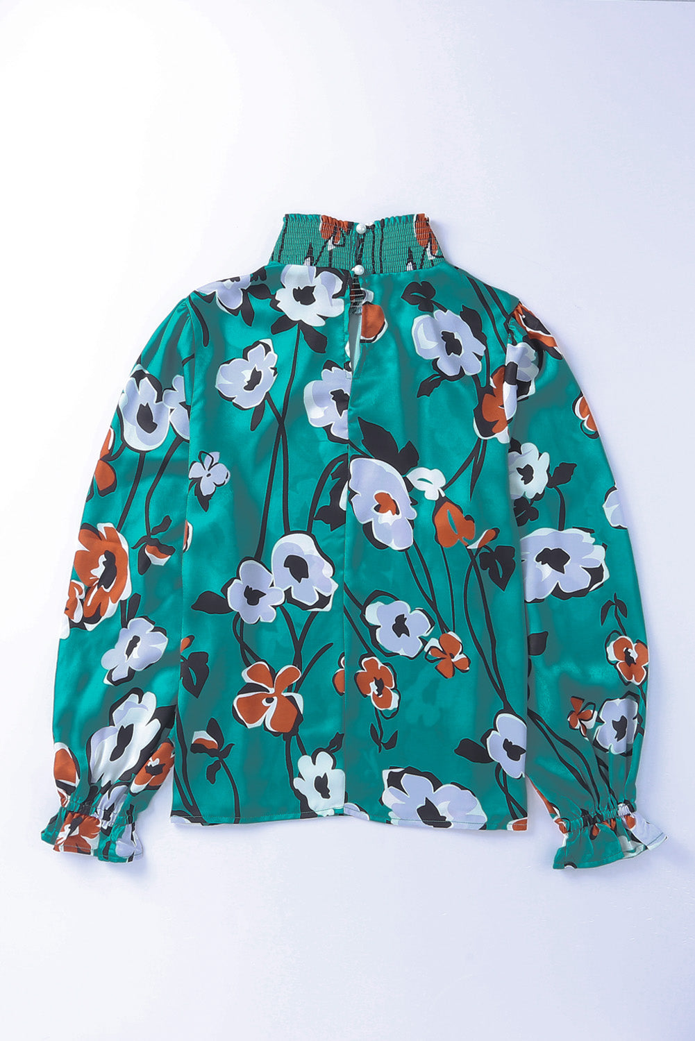 Blouse smockée à col montant et imprimé floral