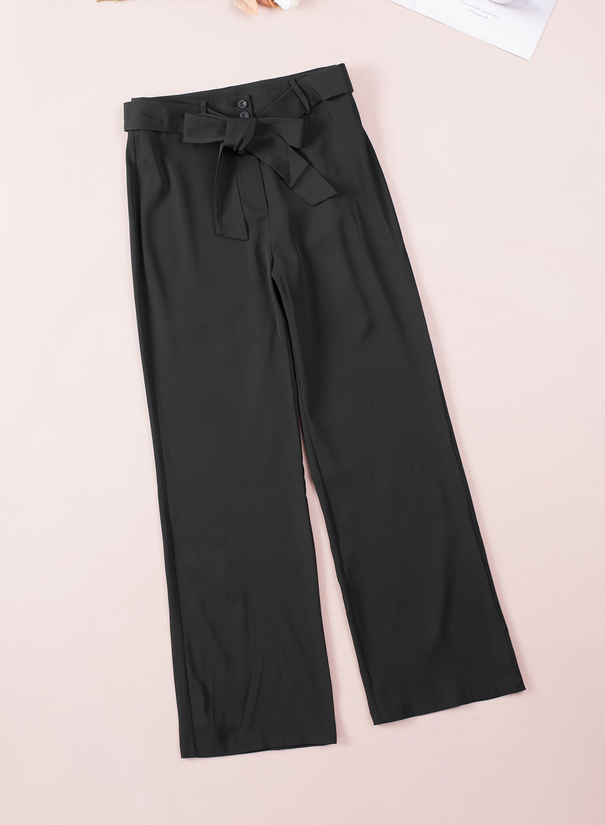 Pantalon évasé noir taille haute noué sur le devant