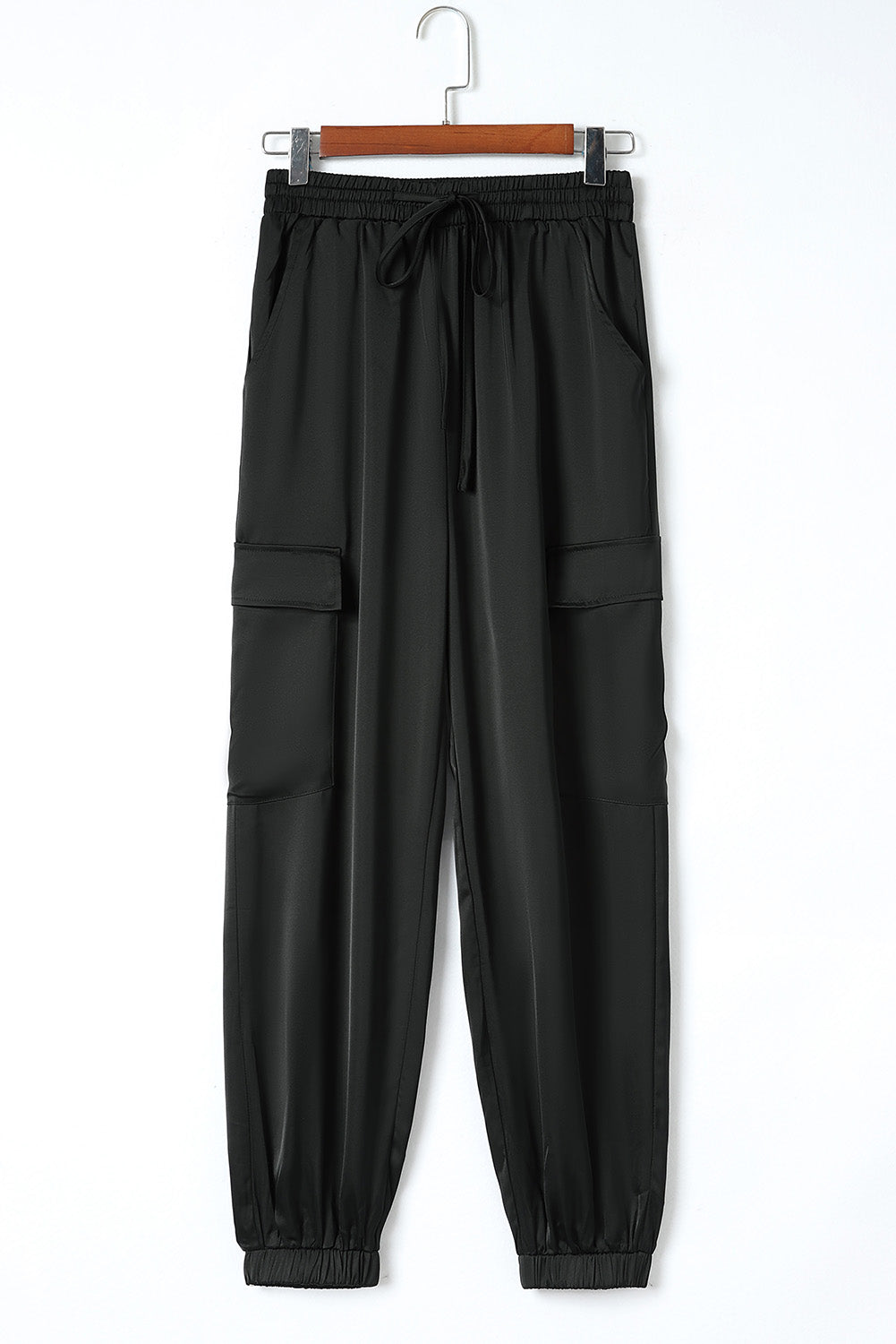 Pantalon noir en satin avec poches et cordon de serrage à taille élastique