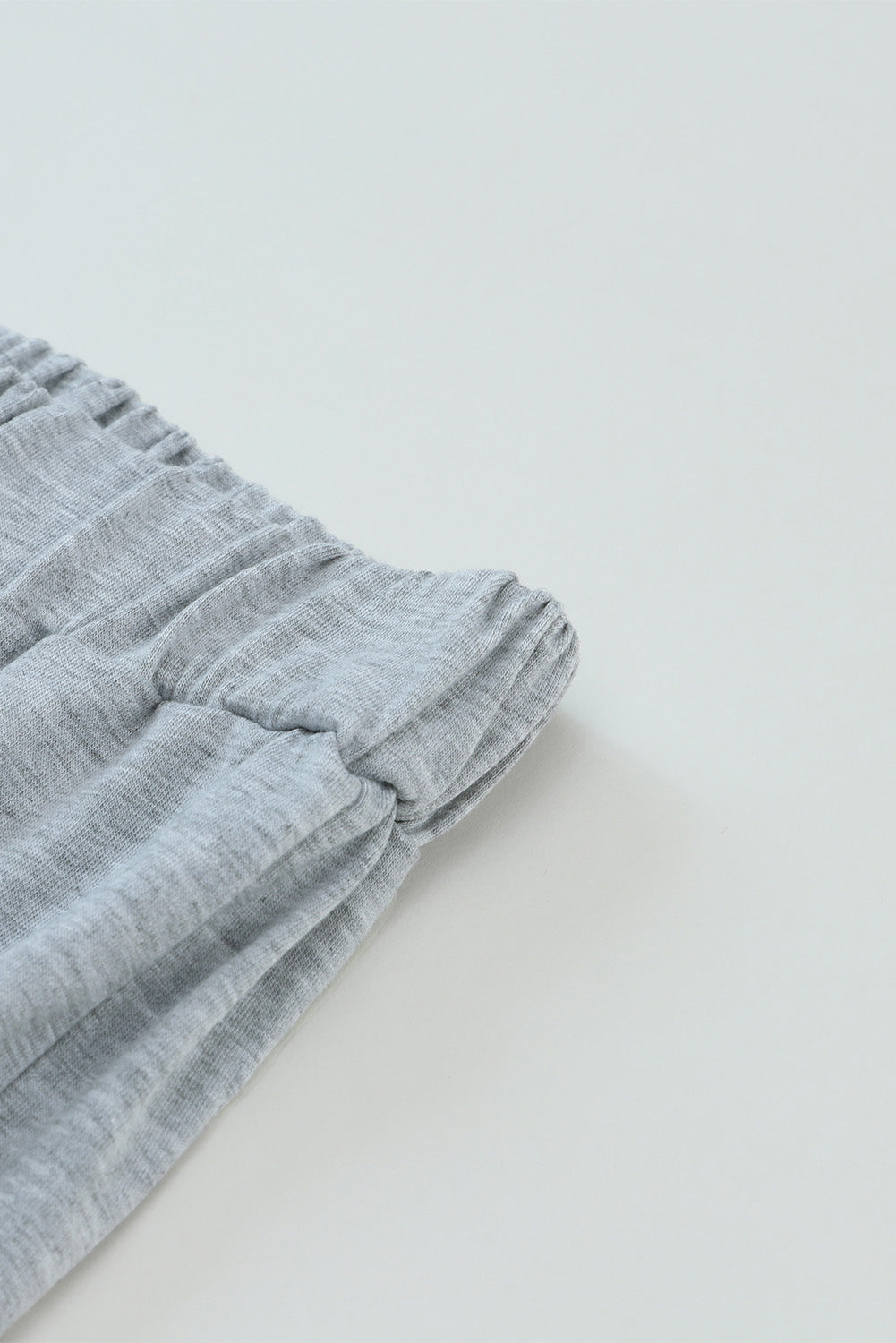 Pantalon taille haute gris à fentes latérales et jambes larges