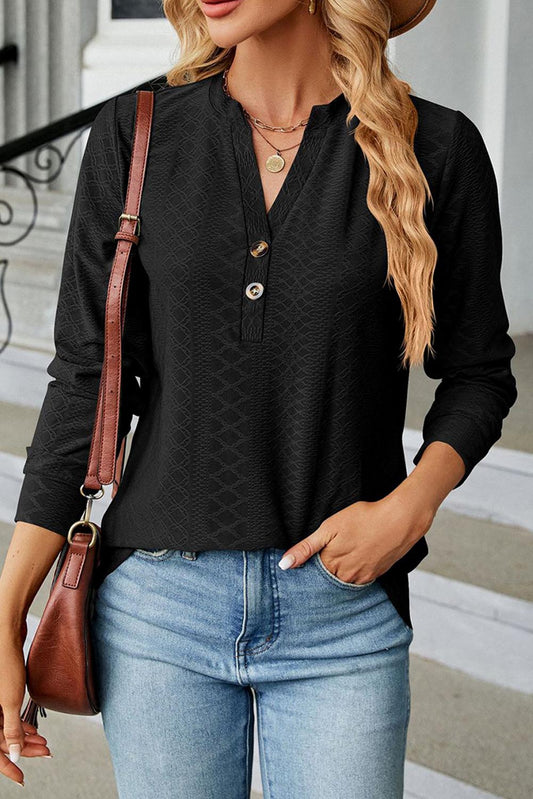 Blouse boutonnée noire en jacquard à col en V