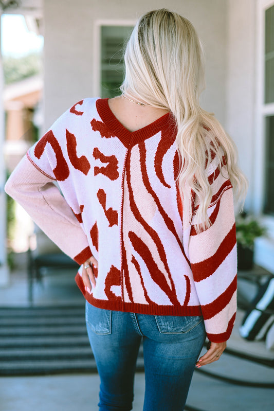 Pull oversize rouge en tricot à motifs mélangés et bordure côtelée