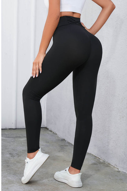 Legging taille haute noir croisé avec contrôle du ventre 