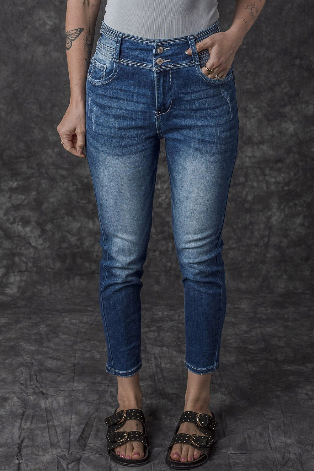 Jean skinny taille haute bleu délavé vintage à deux boutons 