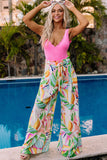 Pantalon large à ceinture et imprimé feuilles tropicales multicolore