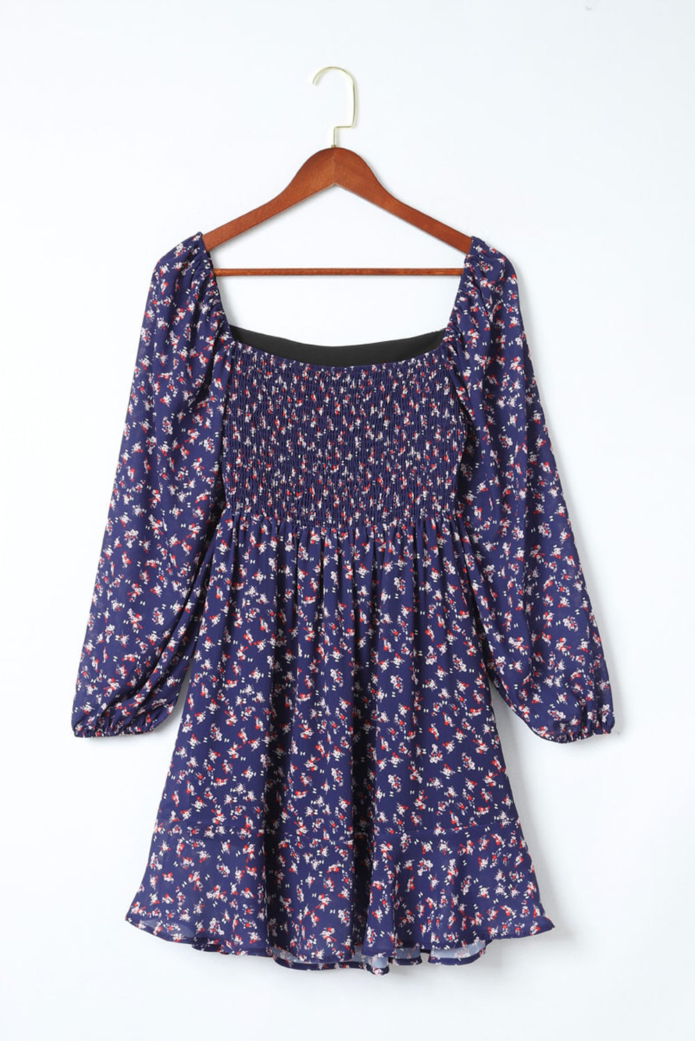 Robe bleue smockée à imprimé floral et manches bouffantes à col carré