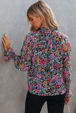 Blouse multicolore à col en V et manches longues à volants et imprimé floral