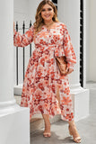 Robe longue orange à imprimé floral et col en V de grande taille