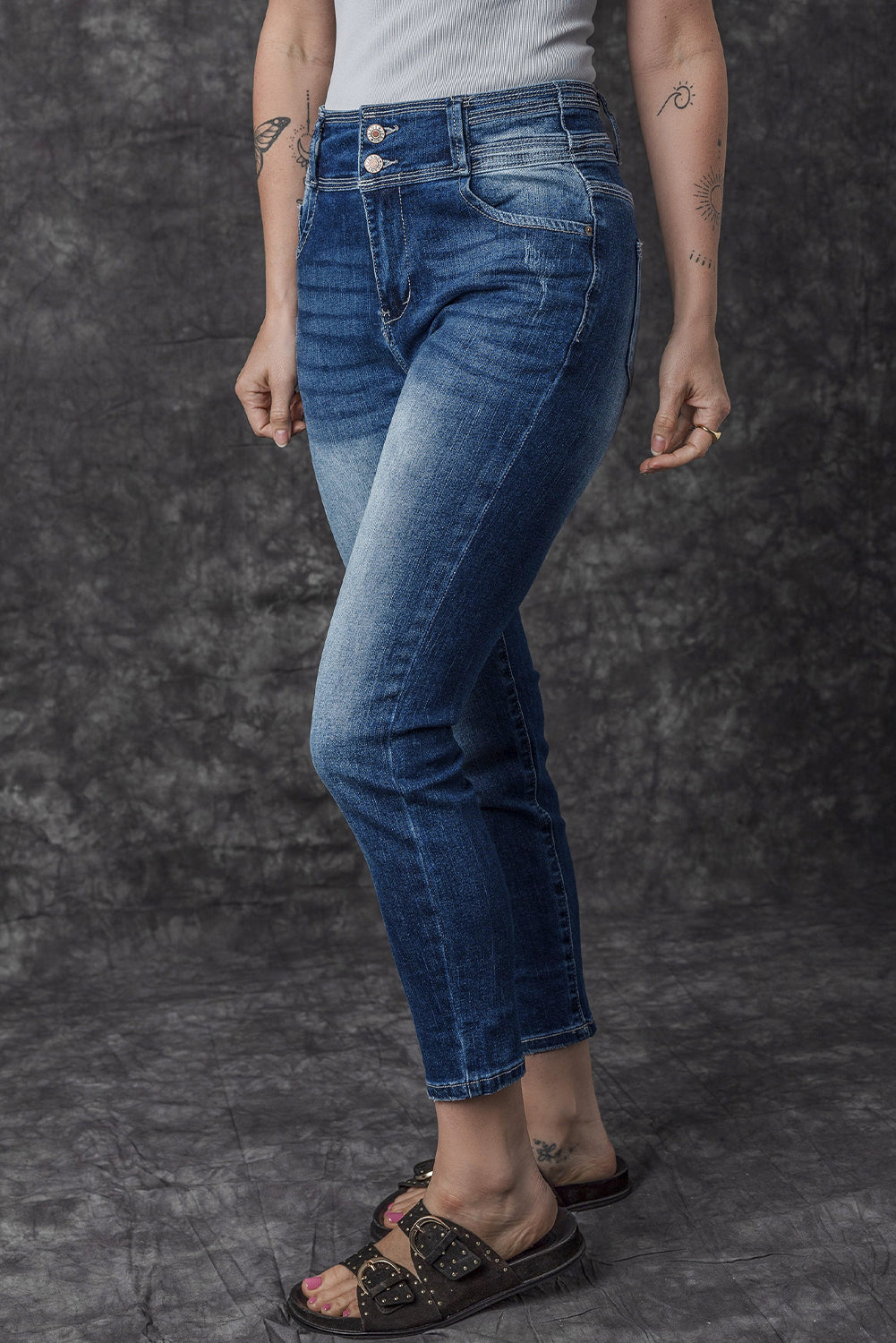 Jean skinny taille haute bleu délavé vintage à deux boutons 