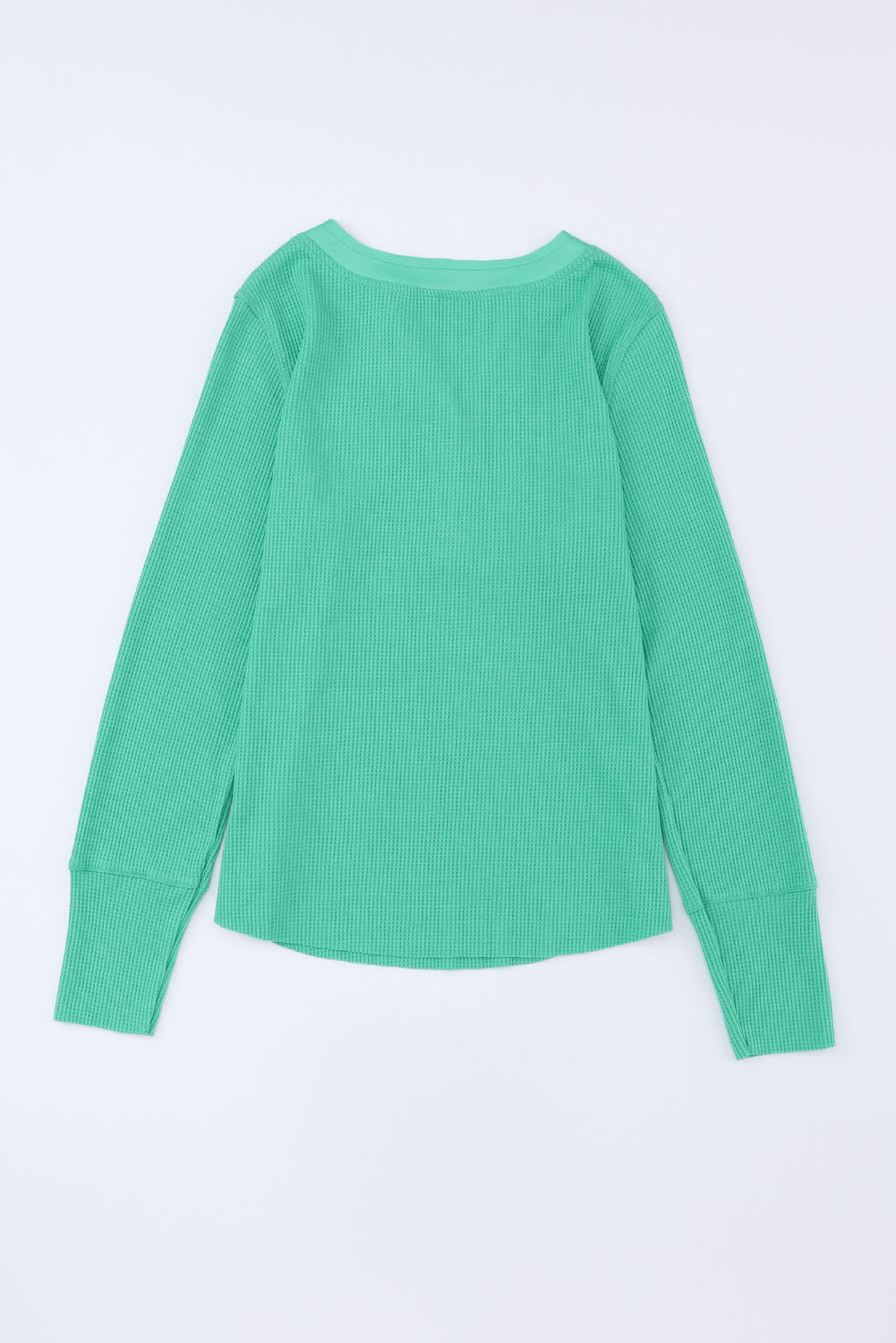 Haut Henley en tricot gaufré vert à encolure bordée