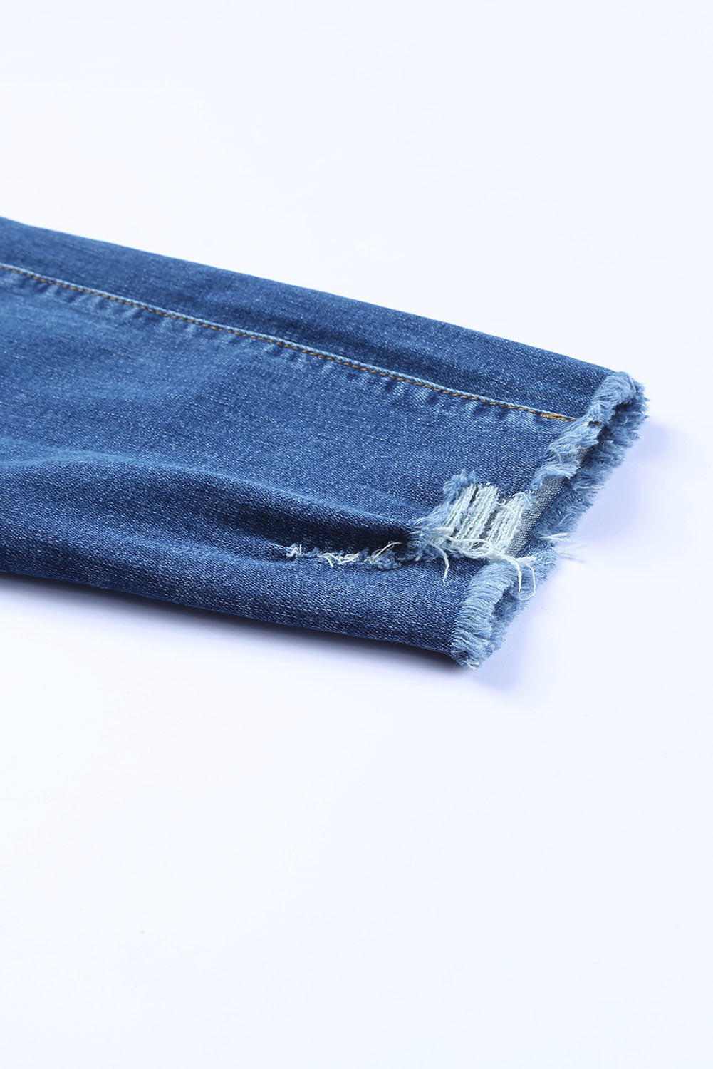 Jean skinny bleu longueur cheville à ourlet brut