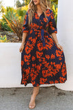 Robe longue plissée à fleurs orange avec col en V et cravate