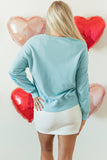 Apricot Pink Sequined Bowknot Drop Shoulder Oversized Sweatshirt