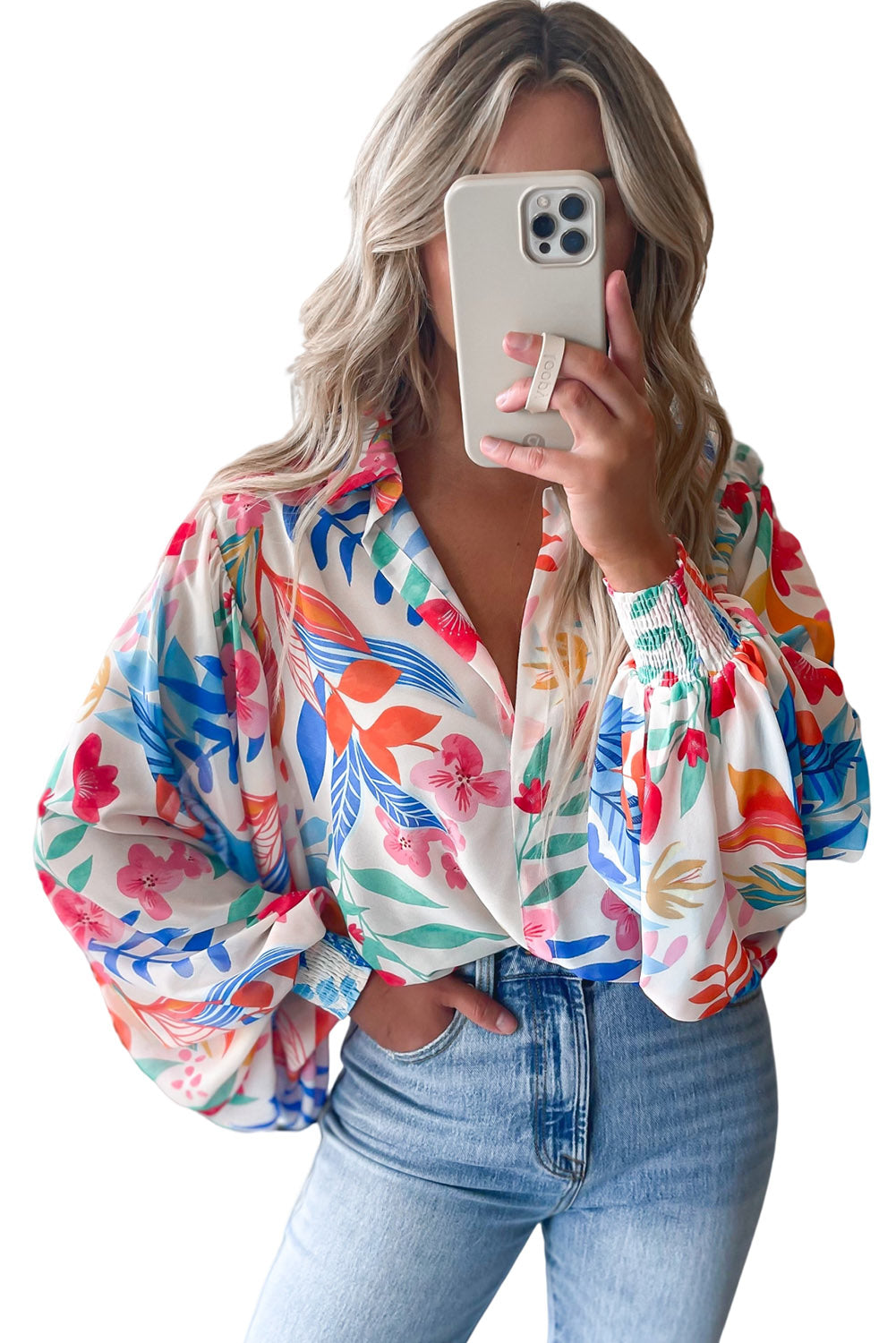 Chemise multicolore à manches bouffantes et imprimé floral vibrant