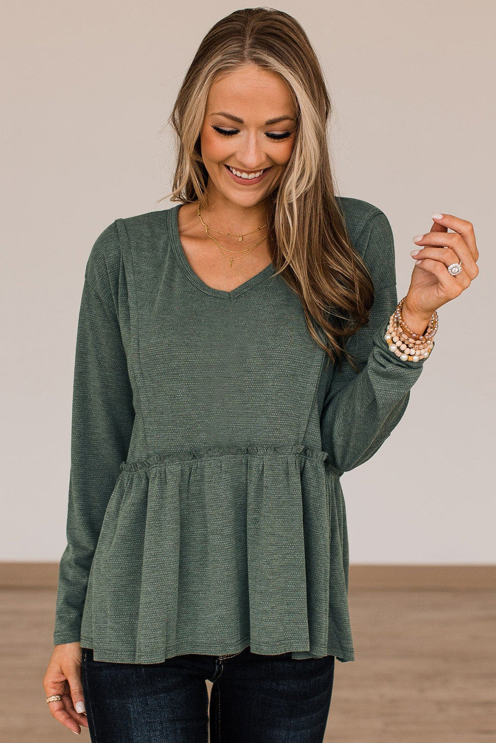 Outseam Detail Long Sleeve Peplum Top