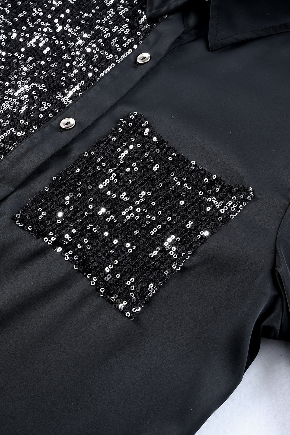 Robe chemise boutonnée noire à paillettes et poche