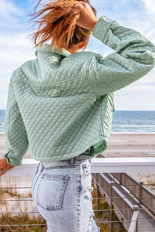 Veste courte matelassée verte avec poches et fermeture éclair