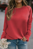 Sweat-shirt rouge uni à col rond et manches raglan 