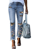 Jean skinny déchiré à patch imprimé bleu ciel