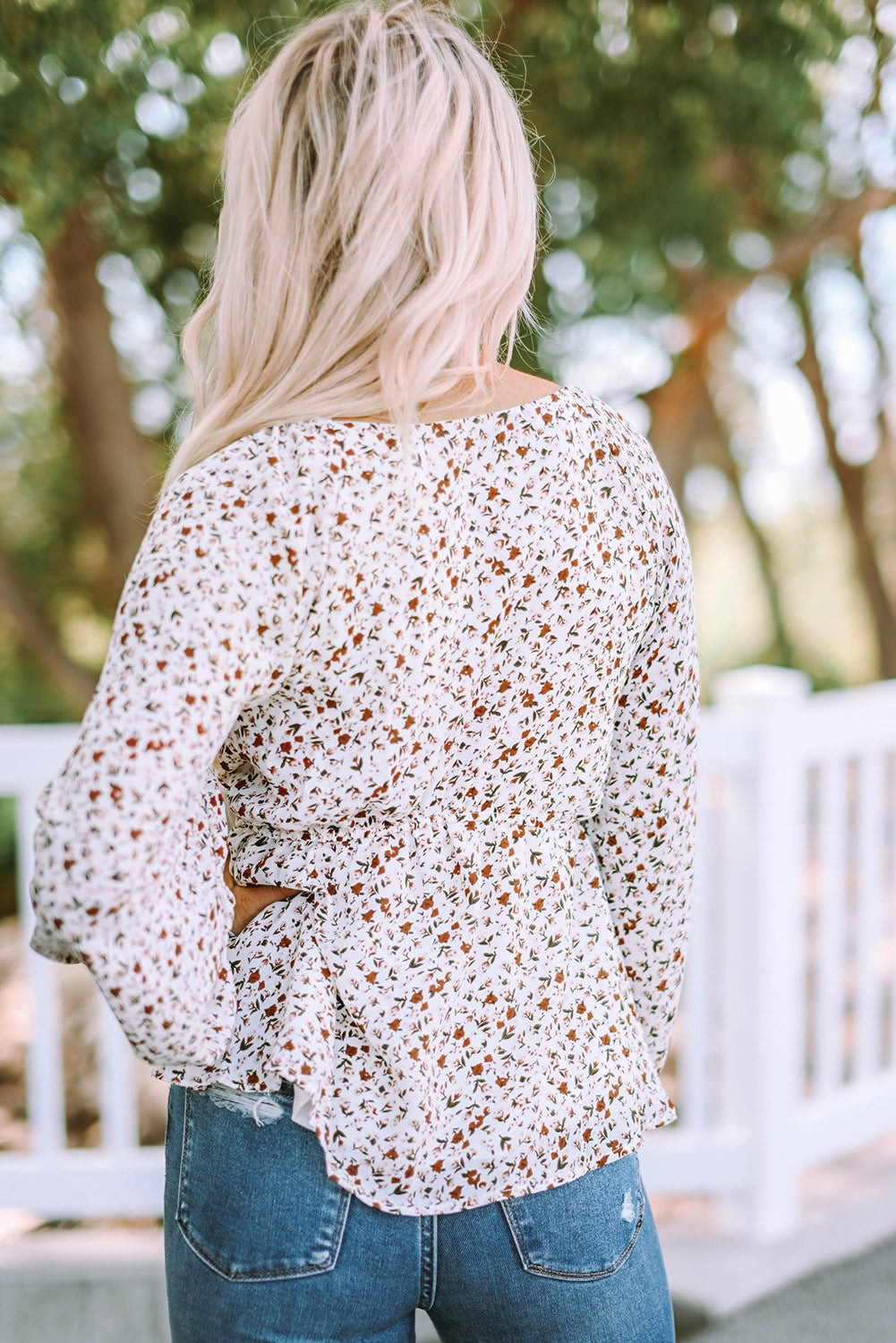 Blouse à manches longues à volants et imprimé floral noué sur le devant