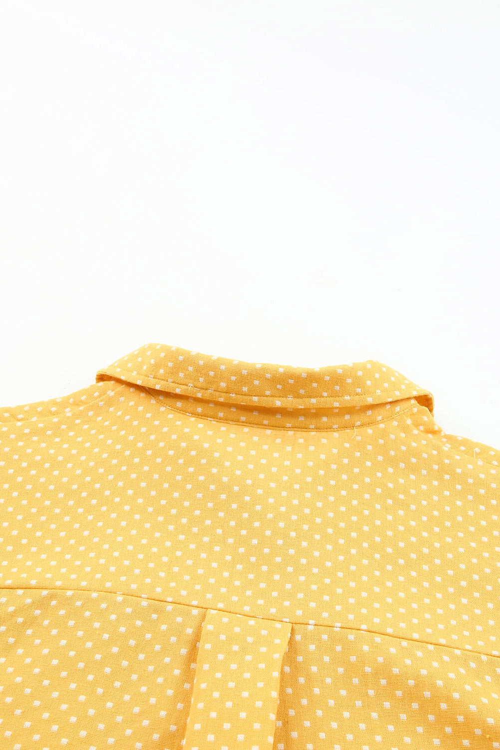 Chemise jaune roulée à manches courtes et imprimé à pois