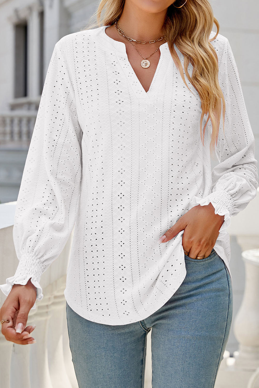 Blouse ample texturée blanche à col fendu