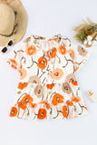 Blouse babydoll orange à imprimé floral et col volanté 