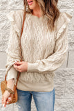 Pull beige en tricot torsadé avec épaules volantées