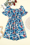 Robe florale bleue à volants et col carré