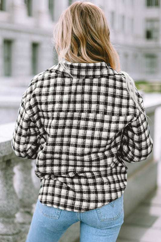 Veste tunique boutonnée noire à imprimé écossais avec poches poitrine