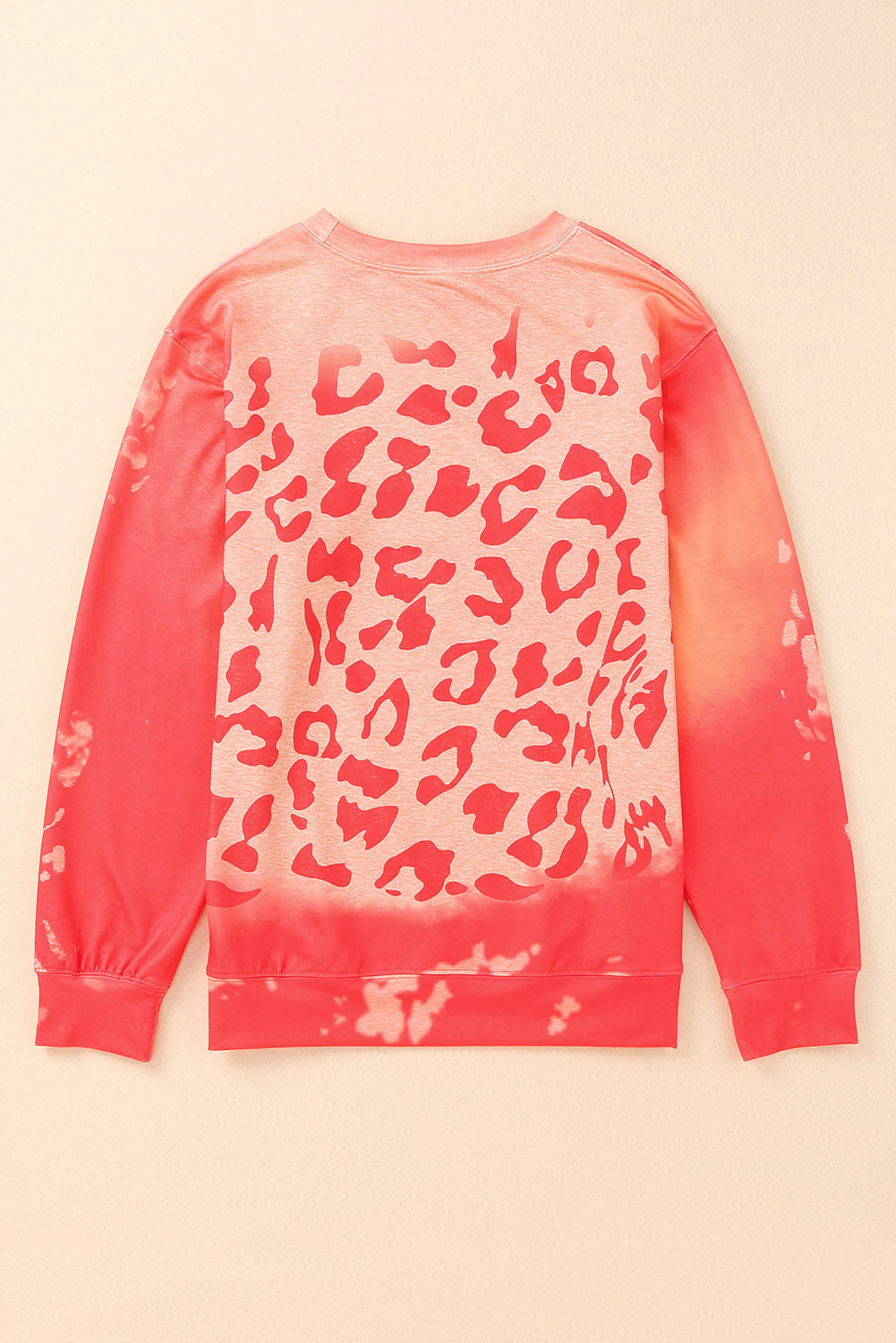 Sweat-shirt rose à imprimé guépard blanchi