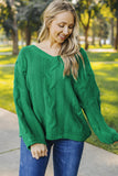 Pull vert en tricot tressé à col en V Bubblegum