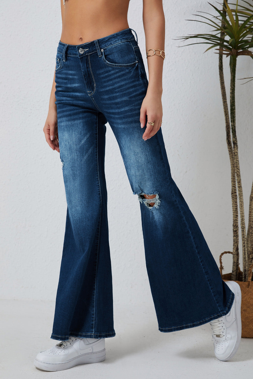 Asymmetric Open Knee Distressed Flare Jeans