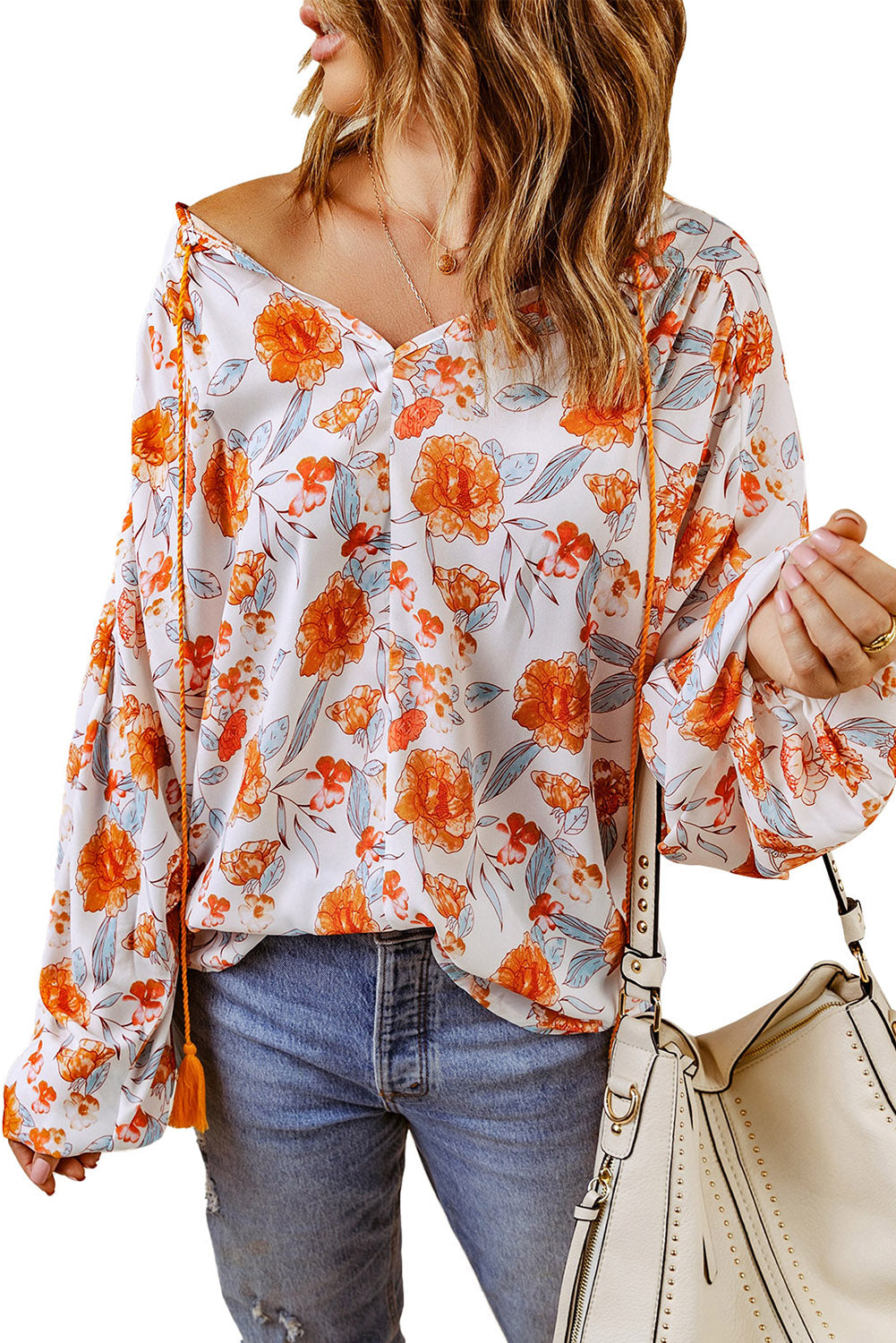 Blouse dolman orange fendue à col en V et imprimé floral 