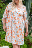 Robe florale orange à manches nouées et col carré de grande taille 