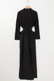 Robe noire côtelée à manches longues et découpe torsadée