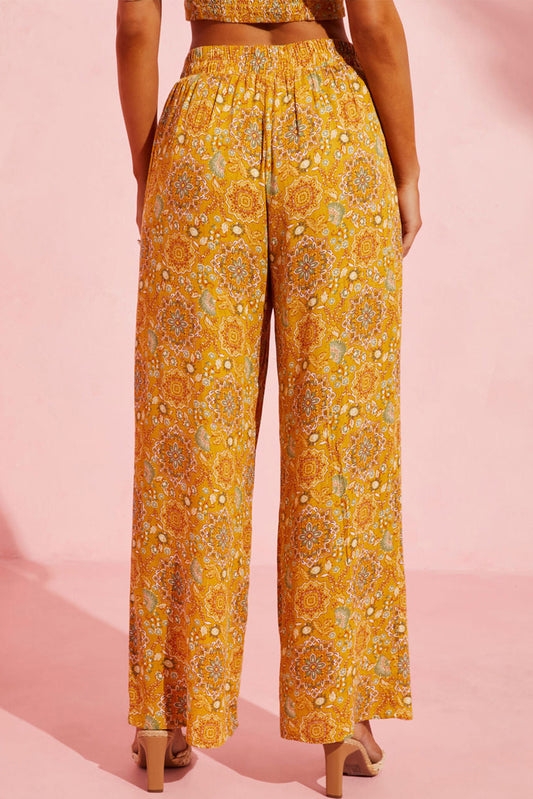 Pantalon large à poches et imprimé floral bohème jaune 