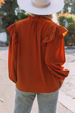 Blouse orange plissée à volants et boutonnée à col en V