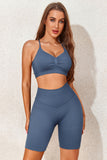 Ensemble actif haut court croisé bleu ciel et short taille haute