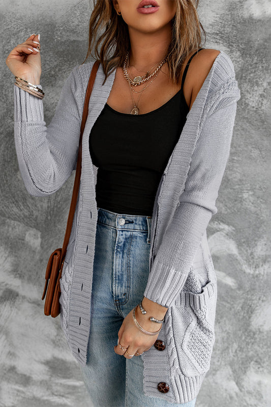 Cardigan gris avec poche avant et fermeture à boutons