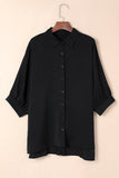 Chemise oversize noire à manches 3/4 bouffantes