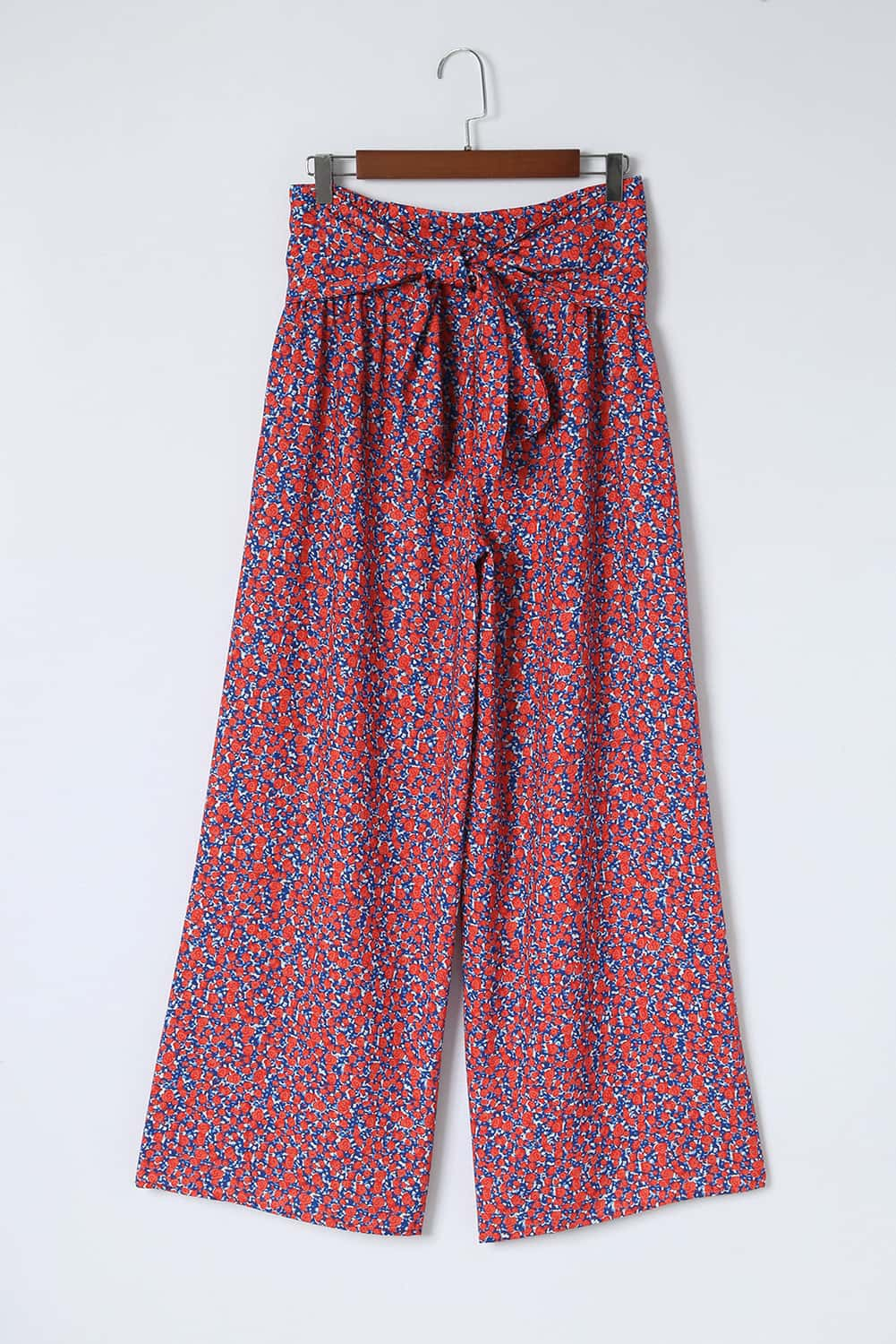 Pantalon large à petites fleurs et imprimé floral noué sur le devant 