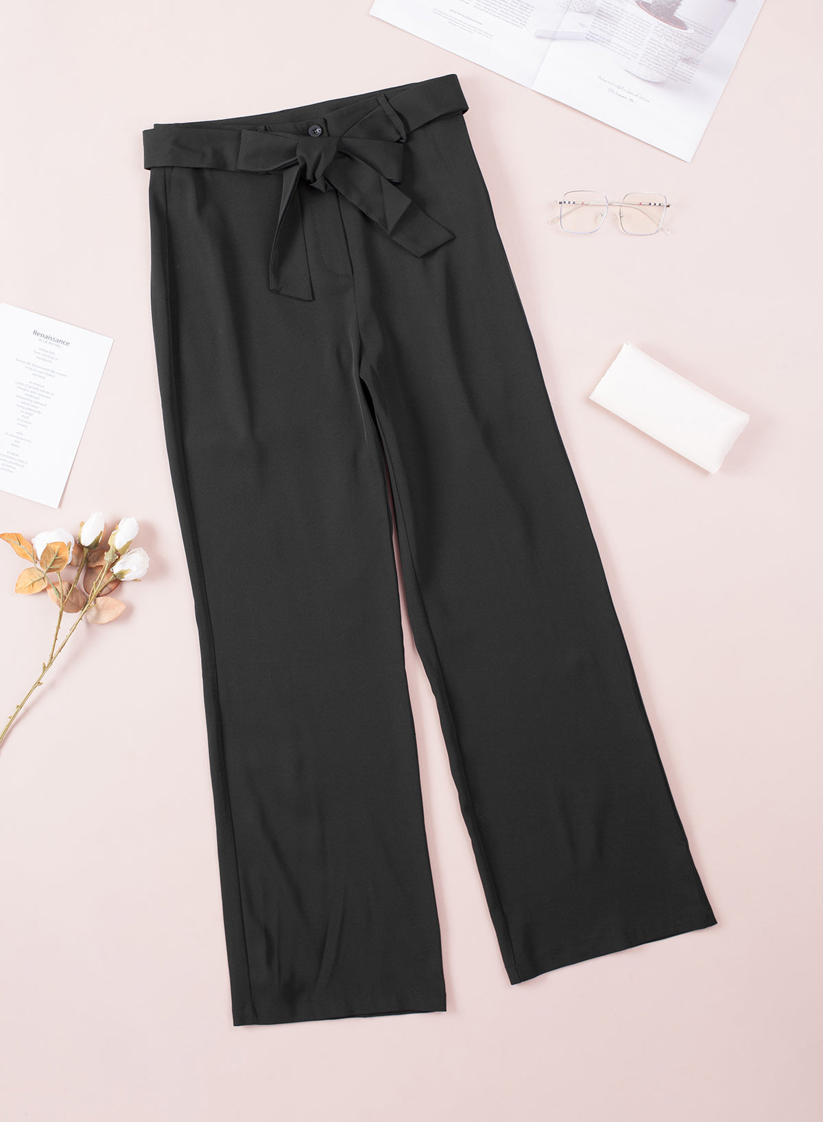 Pantalon évasé noir taille haute noué sur le devant