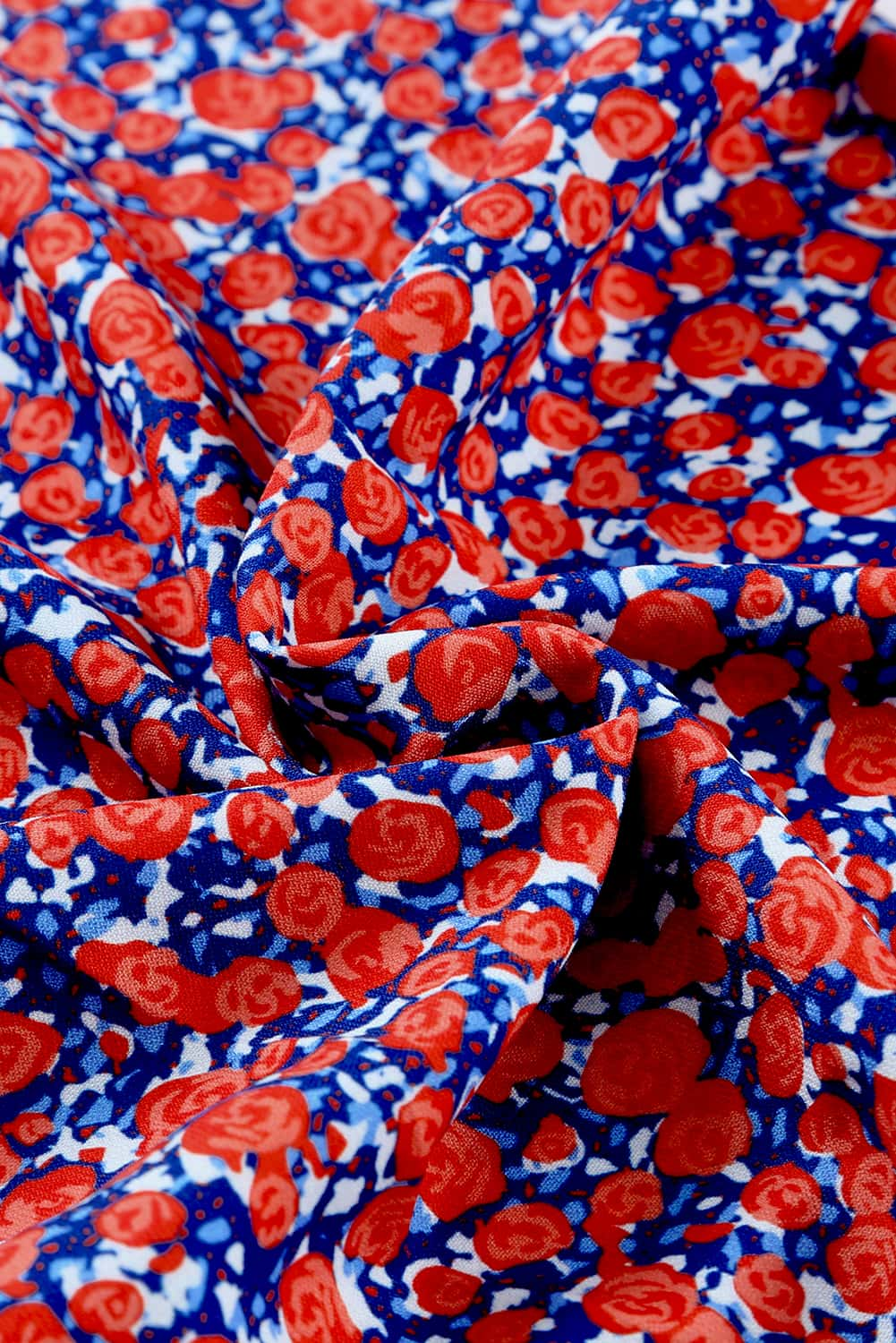 Pantalon large à petites fleurs et imprimé floral noué sur le devant 