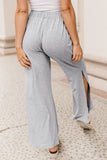 Pantalon taille haute gris à fentes latérales et jambes larges