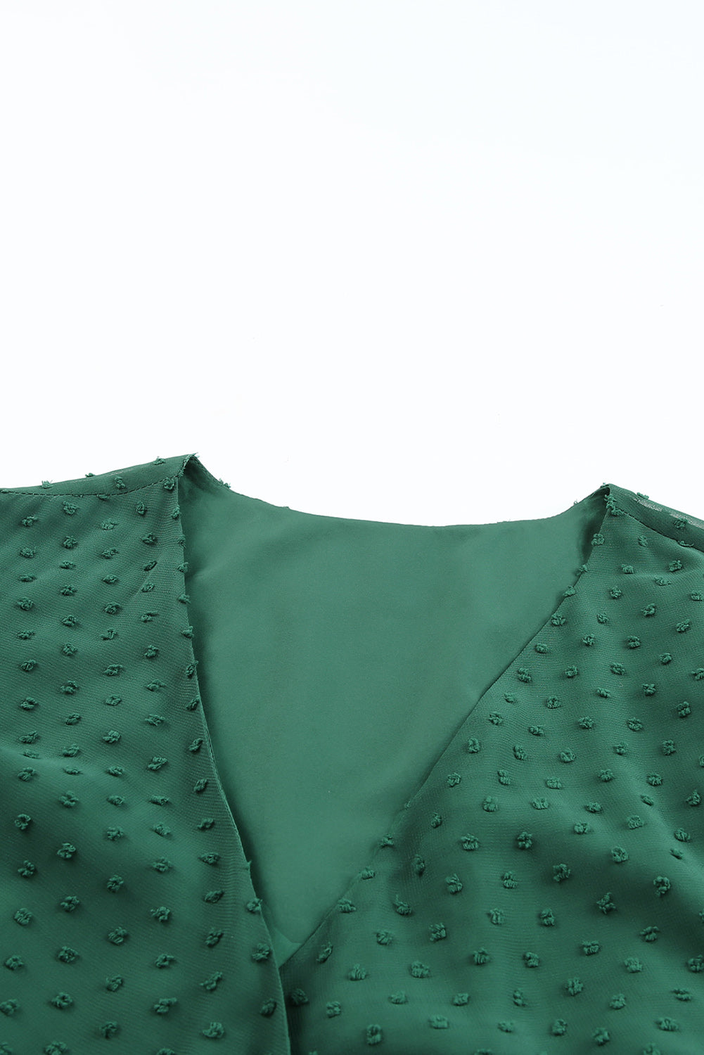 Robe portefeuille verte à manches bouffantes et pois suisses de grande taille 