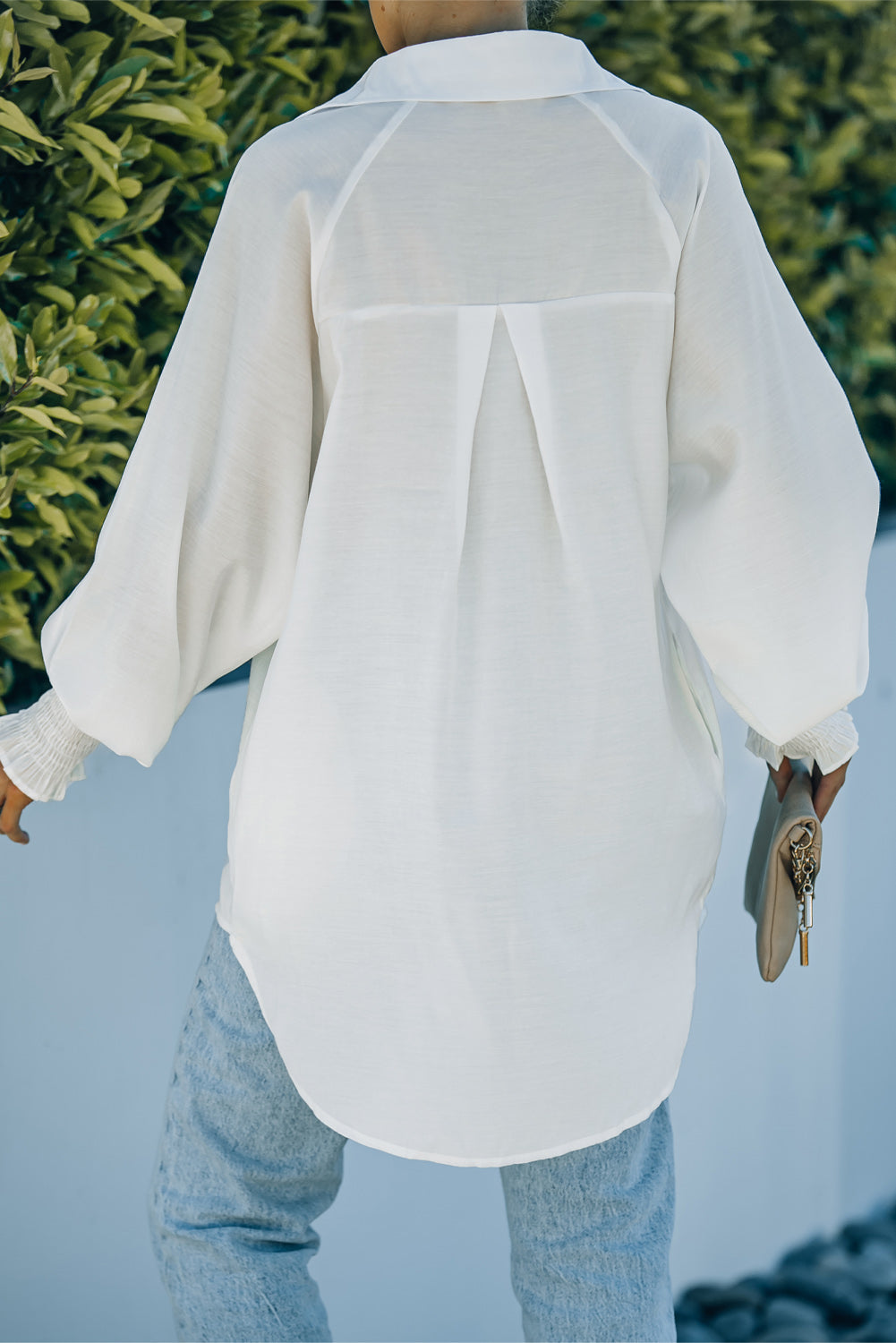 Chemise bleue à poches et manches bouffantes